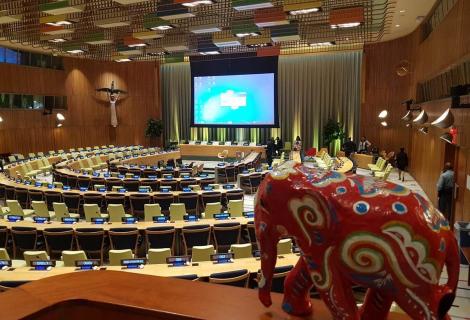 A model elephant in a large meeting hall