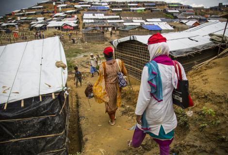 Women walk down a hill to the densely populated Mainnerghona refugee camp, Cox's Bazar