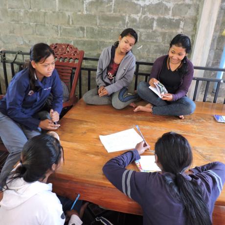 Young women taking part in a research exercise in Cambodia