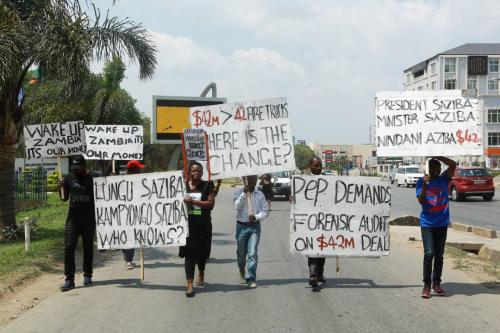 A group of protesters on their way to parliament