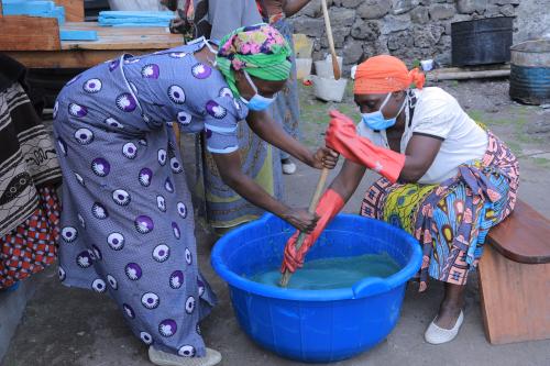 Women producing soap