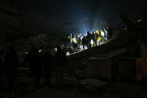 Volunteers work through the night to rescue a woman who was trapped for over 30 hours in Hatay, Turkey