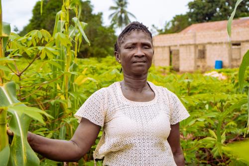 Ngozi, a farmer from Nigeria, in her field