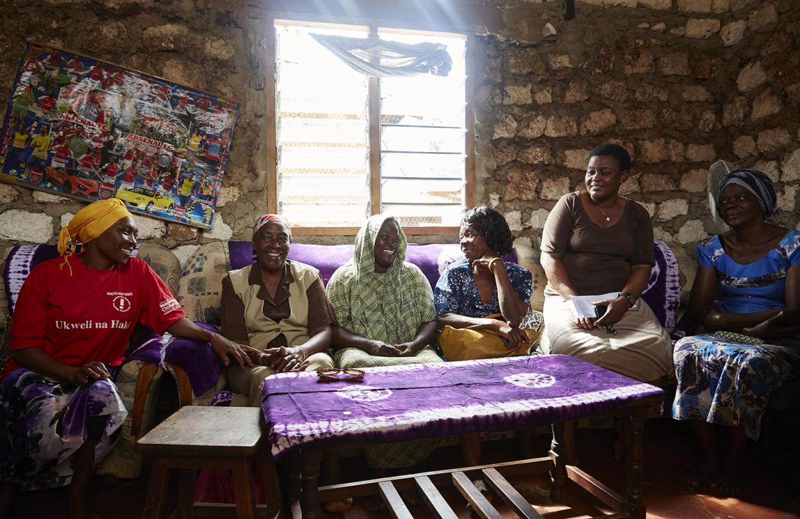 Elizabeth meets with Sauti members to discuss the issues and legal cases they are handling in Kenya.