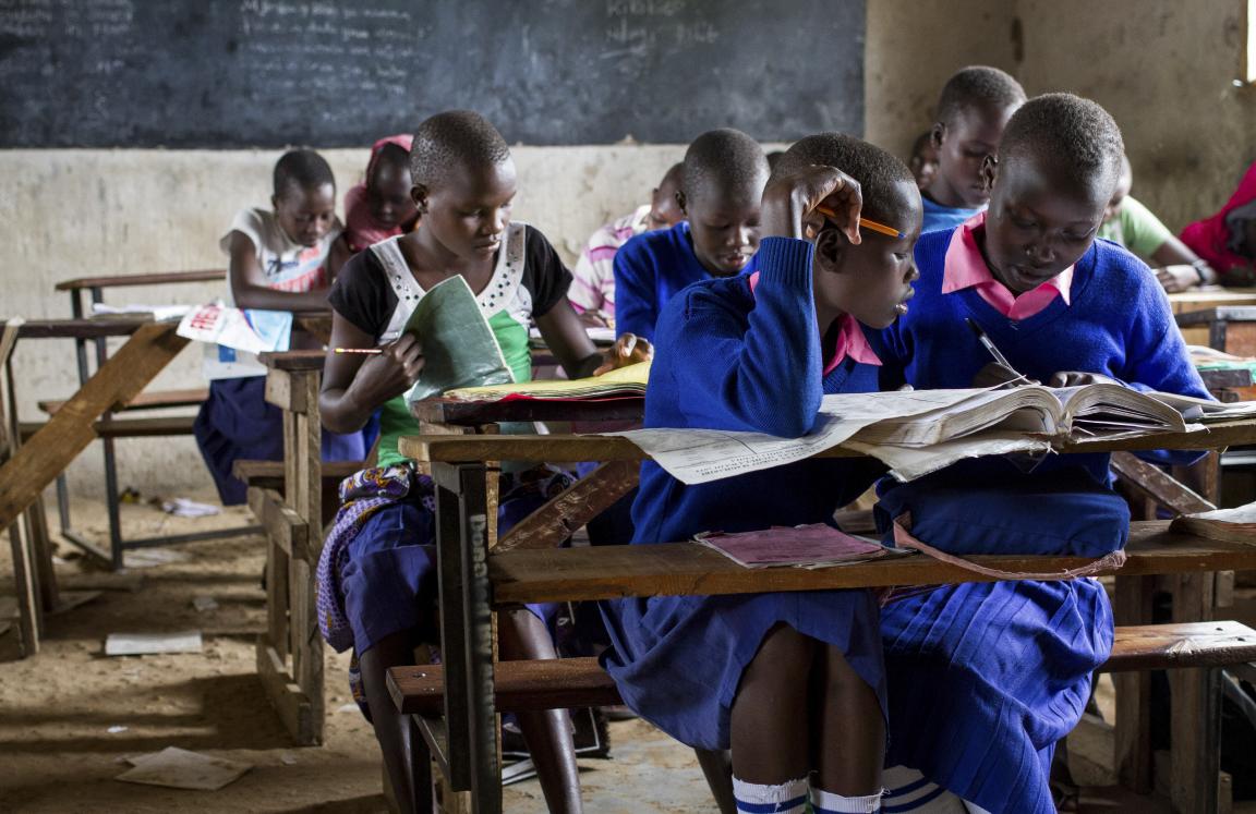 Students Abigail (R) and Purity (L) in class at Kongolai Primary School, West Pokot.