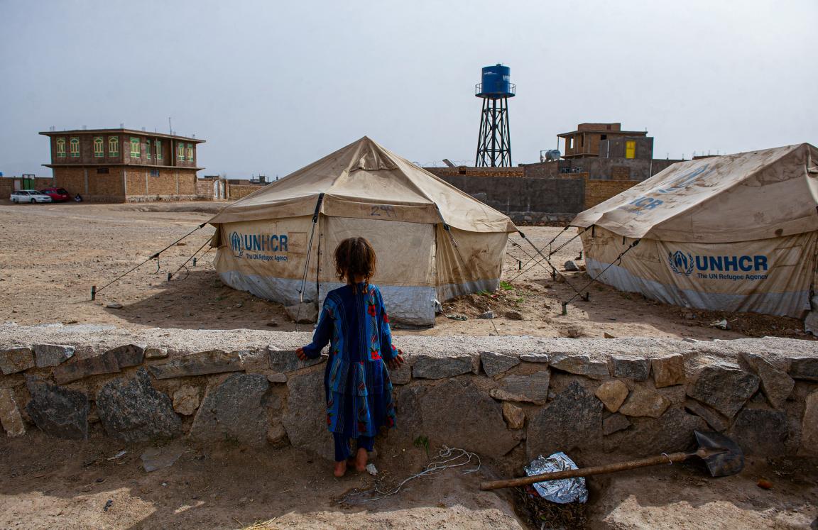 A girl stands in Shaiday refugee camp near Herat, which is home to 42,000 families.