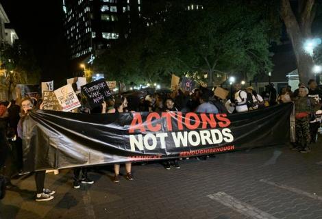 A photo of people demonstrating at the Sandton Shutdown