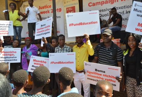 People protesting for education funding