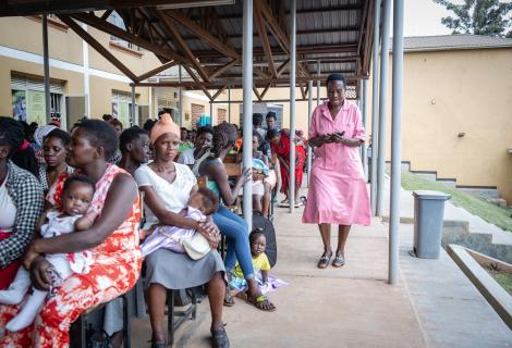 A nurse tending to patients in a health centre