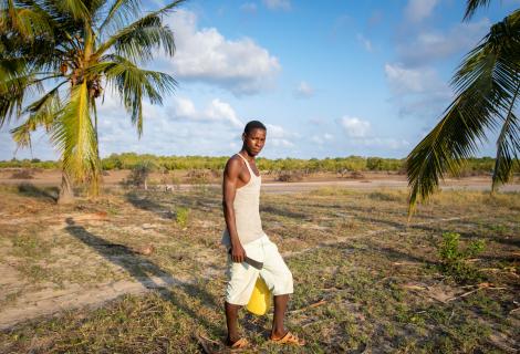 Dickson standing on his land