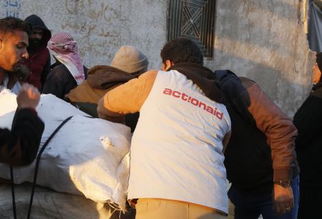 ActionAid's local partner Violet distribute wood and heating materials in Northwest Syria