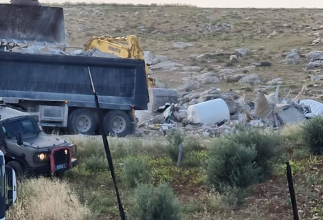 Vehicles demolishing school