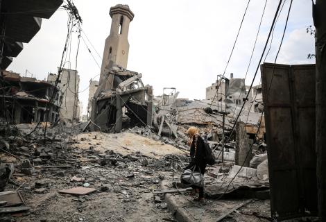 Palestinians inspect a mosque destroyed in Israeli strikes on Gaza City's Shati refugee camp early on October 9, 2023.