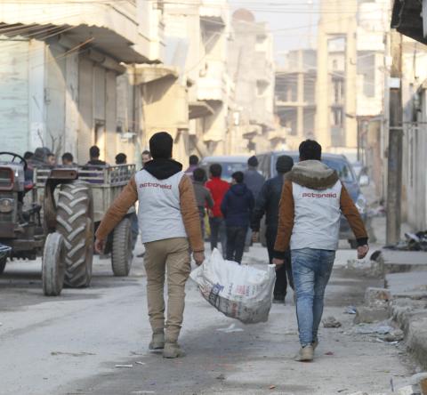 ActionAid's local partner Violet distribute wood and heating materials in Northwest Syria