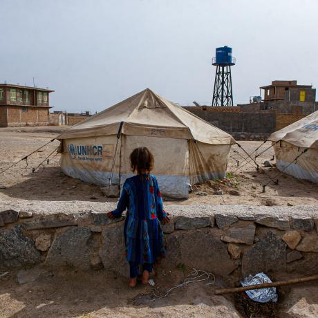A girl stands in Shaiday refugee camp near Herat, which is home to 42,000 families.