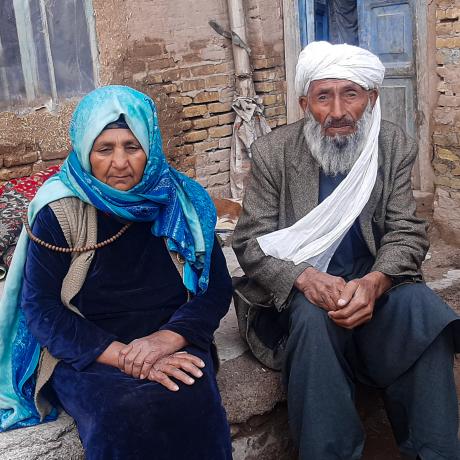 Abdul, 80, and Halima, 75, fled from Shindand District to Herat due to conflict and lack of food.