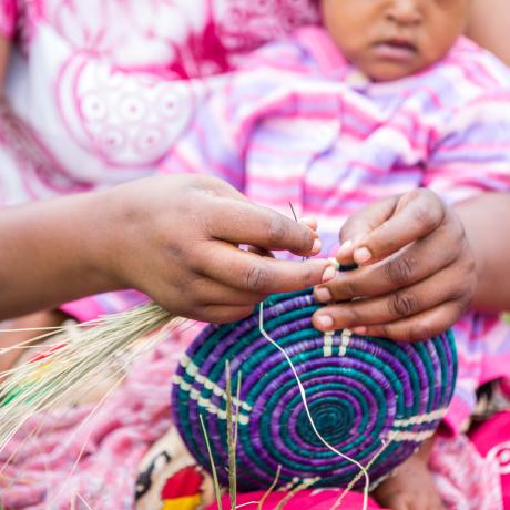 Women work together in an ActionAid supported cooperative in Rwanda.