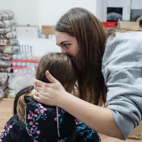 Veronika, a volunteer at Insight NGO an ActionAid partner, with her daughter Daniela at the Insight hub