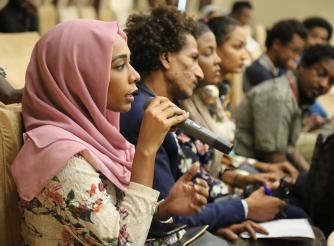 Young people in Sudan talking about their experience in practicing democracy and their role in the political transition at the Youth Open Dialogue