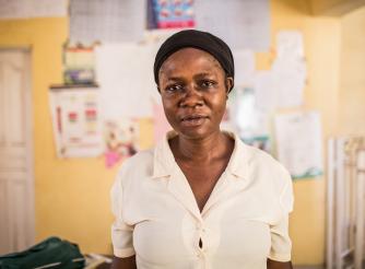 Orji is an unpaid nurse and midwife in a local hospital with no water source, no electricity and no government funding.
