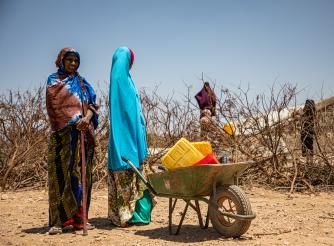 Women collect water in Xidhinta, Somaliland 