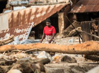 Director of Chigwirizano Women’s Movement and Action Aid partner Loveness Chiwaya is seen moving around Nkhulambe village, inspecting damage in the aftermath of Tropical Cyclone Freddy in Nkhulambe Village.
