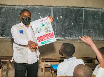 ActionAid raising awareness among primary school children about Ebola prevention and protection measures.