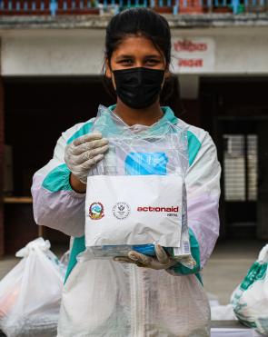 Monalisa, 16, volunteers during an ActionAid Nepal relief distribution, April 2020.