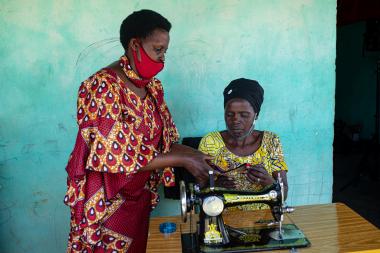 Immaculee and Amina working together at their cooperative The Light of Nyanza 